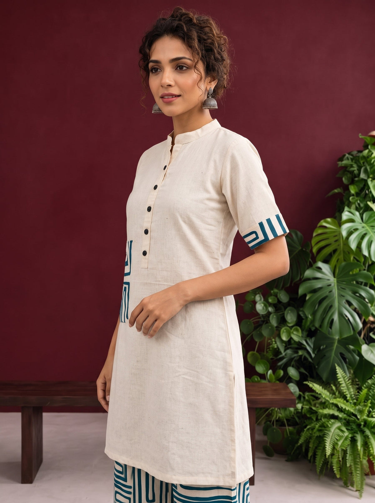 Classic Off-White Cotton Kurta with Contrast Geometric Print Pocket & Coordinated Sleeve Cuffs — styled view