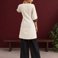 Timeless Off-White Cotton Tunic with Contrast Ajrakh Printed Leaf Panel & Coordinated Zigzag Sleeve Cuffs — back view