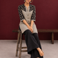 Elegant Black & Beige Cotton Tunic with Chevron Print Body and Floral Block Print Yoke & Sleeves — seated