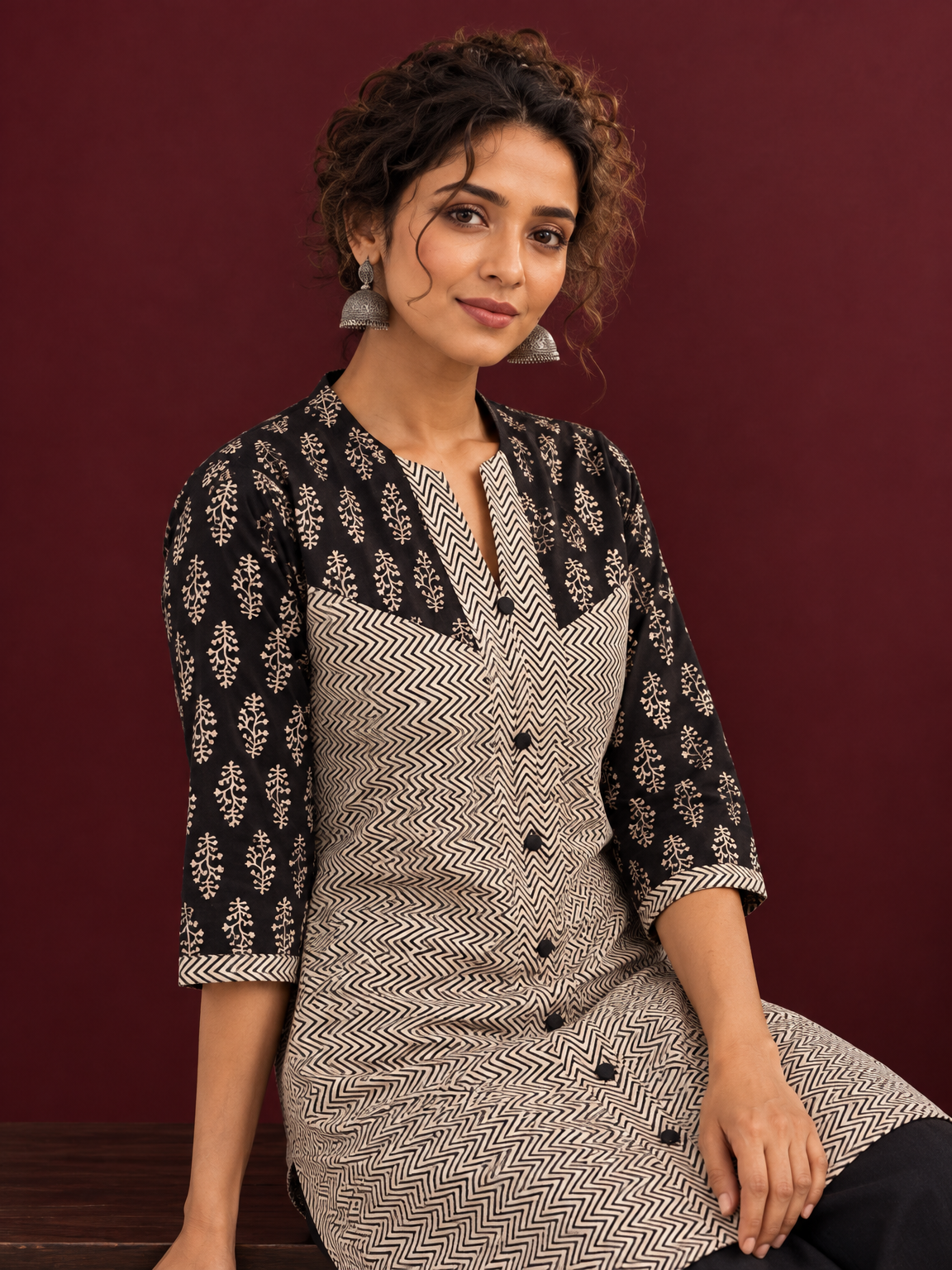 Elegant Black & Beige Cotton Tunic with Chevron Print Body and Floral Block Print Yoke & Sleeves — seated detail