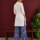 Timeless Off-White Cotton Kurta with Contrast Indigo Floral Print Placket — back view