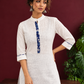 Timeless Off-White Cotton Kurta with Contrast Indigo Floral Print Placket — fabric detail