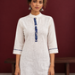 Timeless Off-White Cotton Kurta with Contrast Indigo Floral Print Placket — styled view
