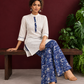 Timeless Off-White Cotton Kurta with Contrast Indigo Floral Print Placket — seated
