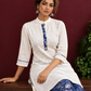 Timeless Off-White Cotton Kurta with Contrast Indigo Floral Print Placket — seated detail