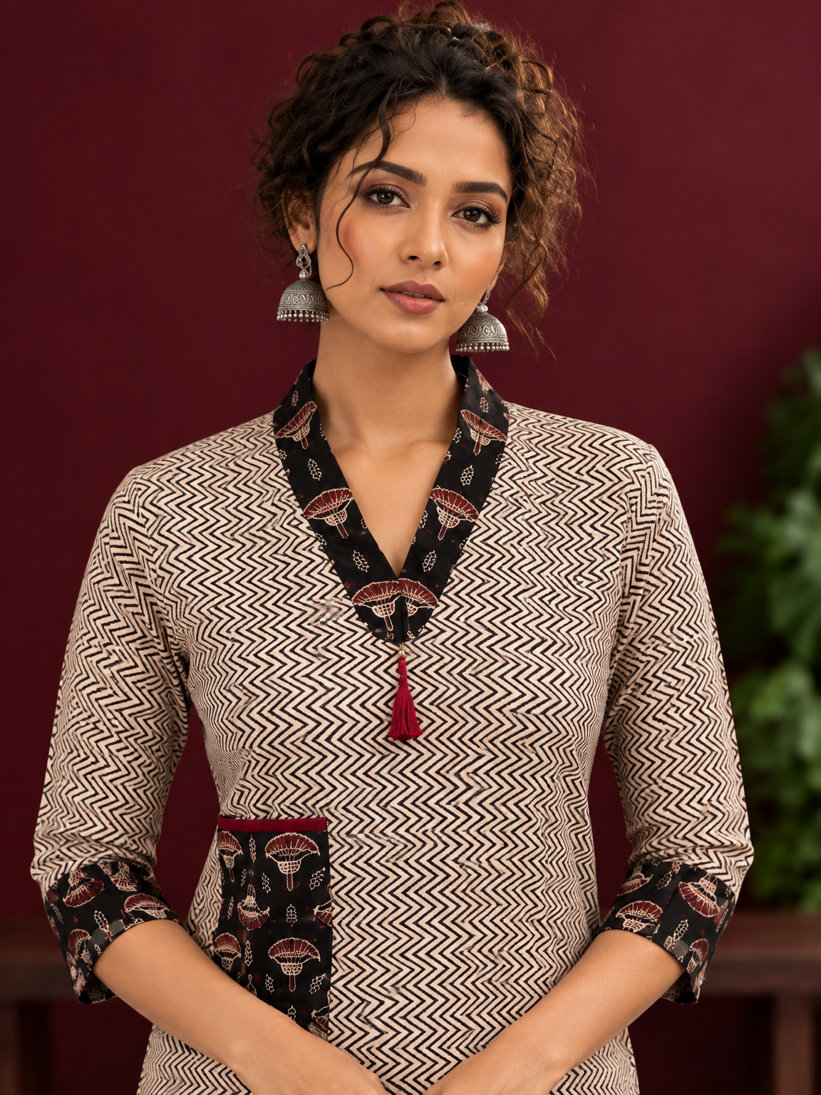 Elegant Beige Cotton Ajrakh Tunic with Contrast V-Neck & Cuff Detailing — fabric detail