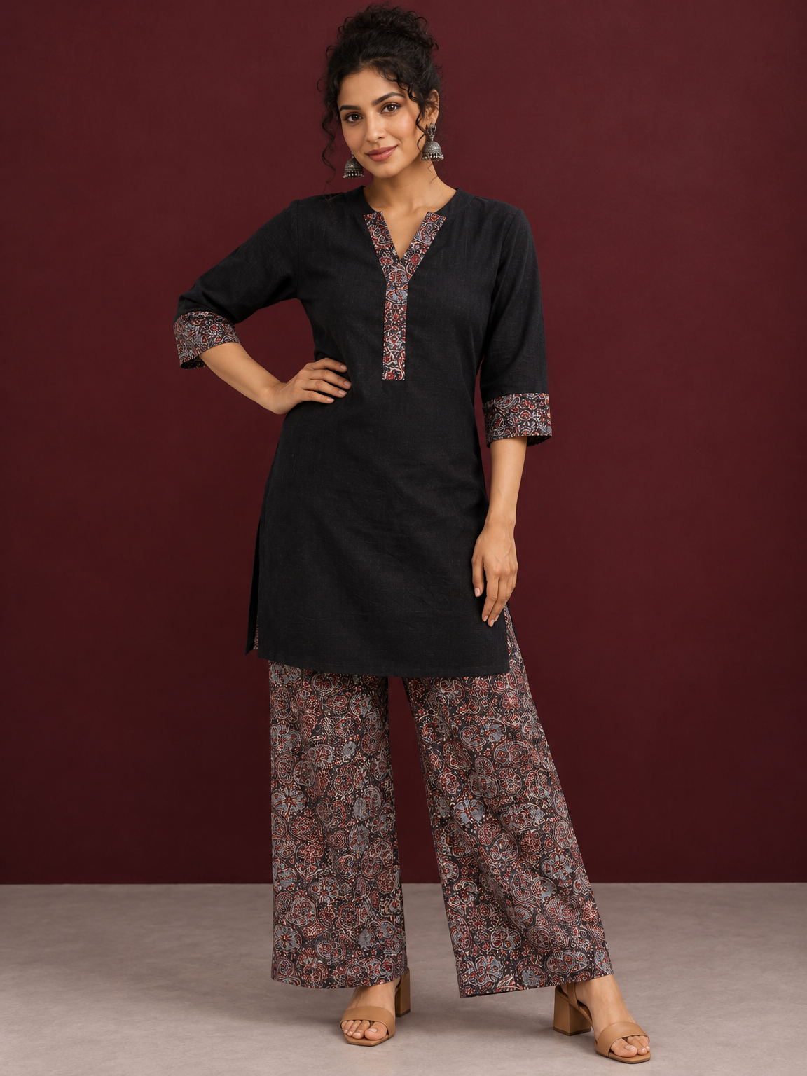 Timeless Black Cotton Tunic with Contrast Ajrakh Print V-Neck Placket & Coordinated Sleeve Cuffs — front view