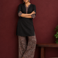 Timeless Black Cotton Tunic with Contrast Ajrakh Print V-Neck Placket & Coordinated Sleeve Cuffs — side view