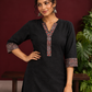 Timeless Black Cotton Tunic with Contrast Ajrakh Print V-Neck Placket & Coordinated Sleeve Cuffs — fabric detail