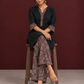 Timeless Black Cotton Tunic with Contrast Ajrakh Print V-Neck Placket & Coordinated Sleeve Cuffs — seated