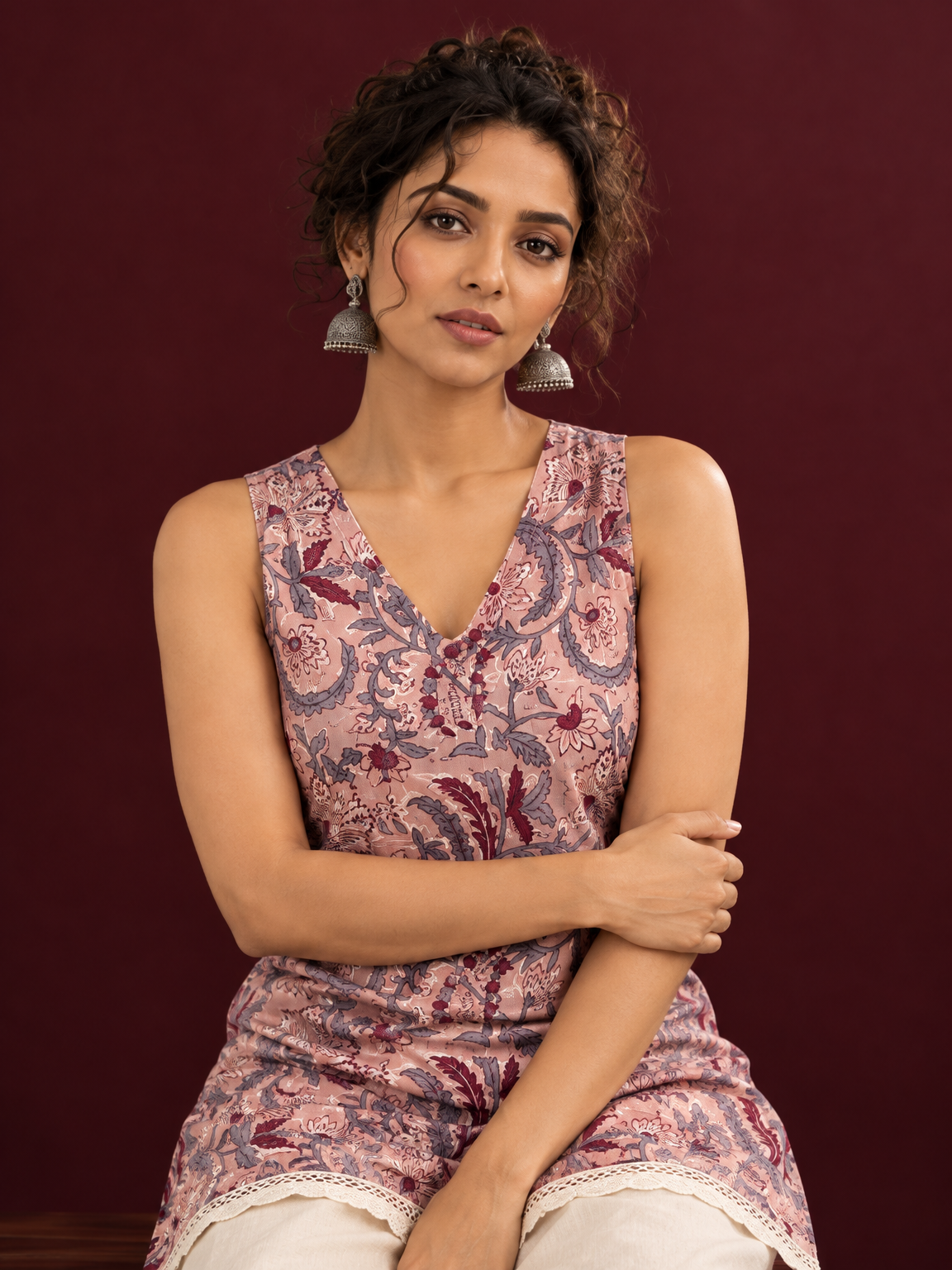 Elegant Pink Cotton Tunic with Grey & Maroon Floral Print and Lace Trim Hemline — seated detail