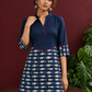 Navy Blue Cotton Tunic with Fish Print Hem Panel, Contrast Maroon Piping & Red Button Detail — styled view