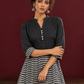 Classic Black & White Pinstripe Tunic with Contrast Striped Panel and Mandarin Collar — styled view