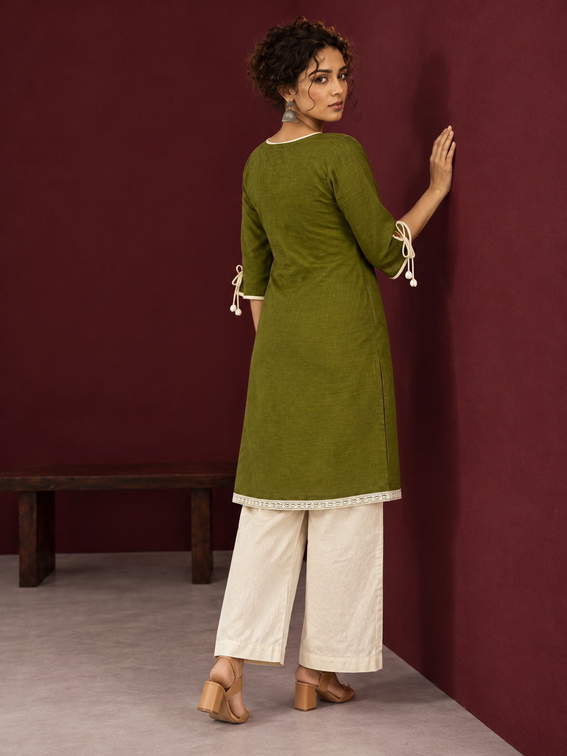 Timeless Olive Green Cotton Tunic with Tasseled Tie-Up Neckline and Contrast Lace Hem Border — back view