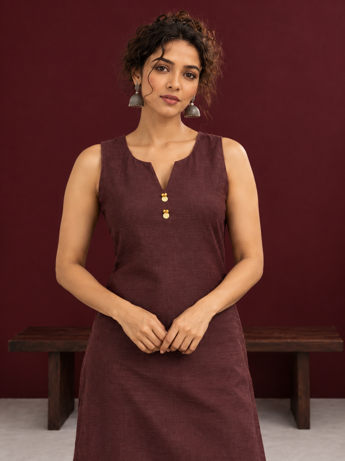 Elegant Brown Cotton Silk Sleeveless Kurta with Gold Zari Border and Notched Neckline — styled view