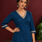 Elegant Teal Blue Cotton Tunic with Embellished Gold Lace V-Neckline and Matching Sleeve Cuffs — styled view