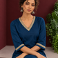 Elegant Teal Blue Cotton Tunic with Embellished Gold Lace V-Neckline and Matching Sleeve Cuffs — seated detail