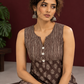 Brown Rayon Sleeveless Tunic with Striped Yoke & Contrast Block Printed Floral Motif Body — seated detail