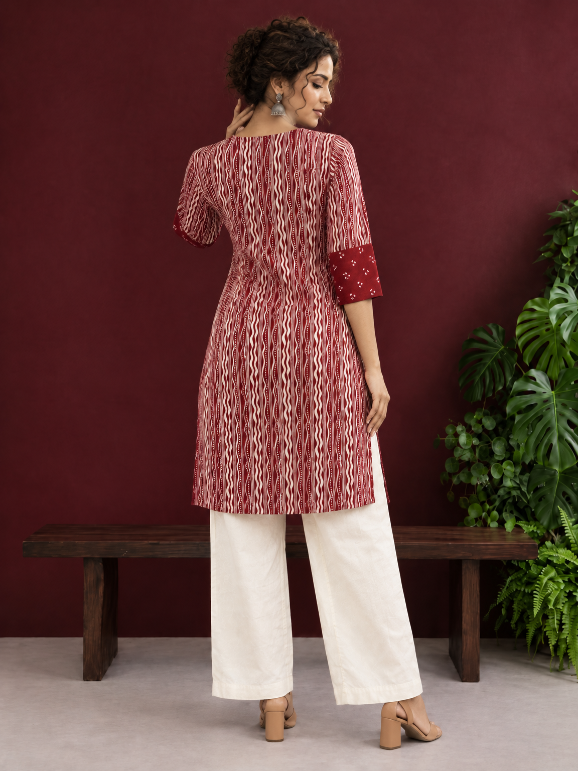 Maroon Rayon Tunic with Bandhani Dot Print Front Panel and Contrast Wavy Striped Sleeves & Side Panels — back view