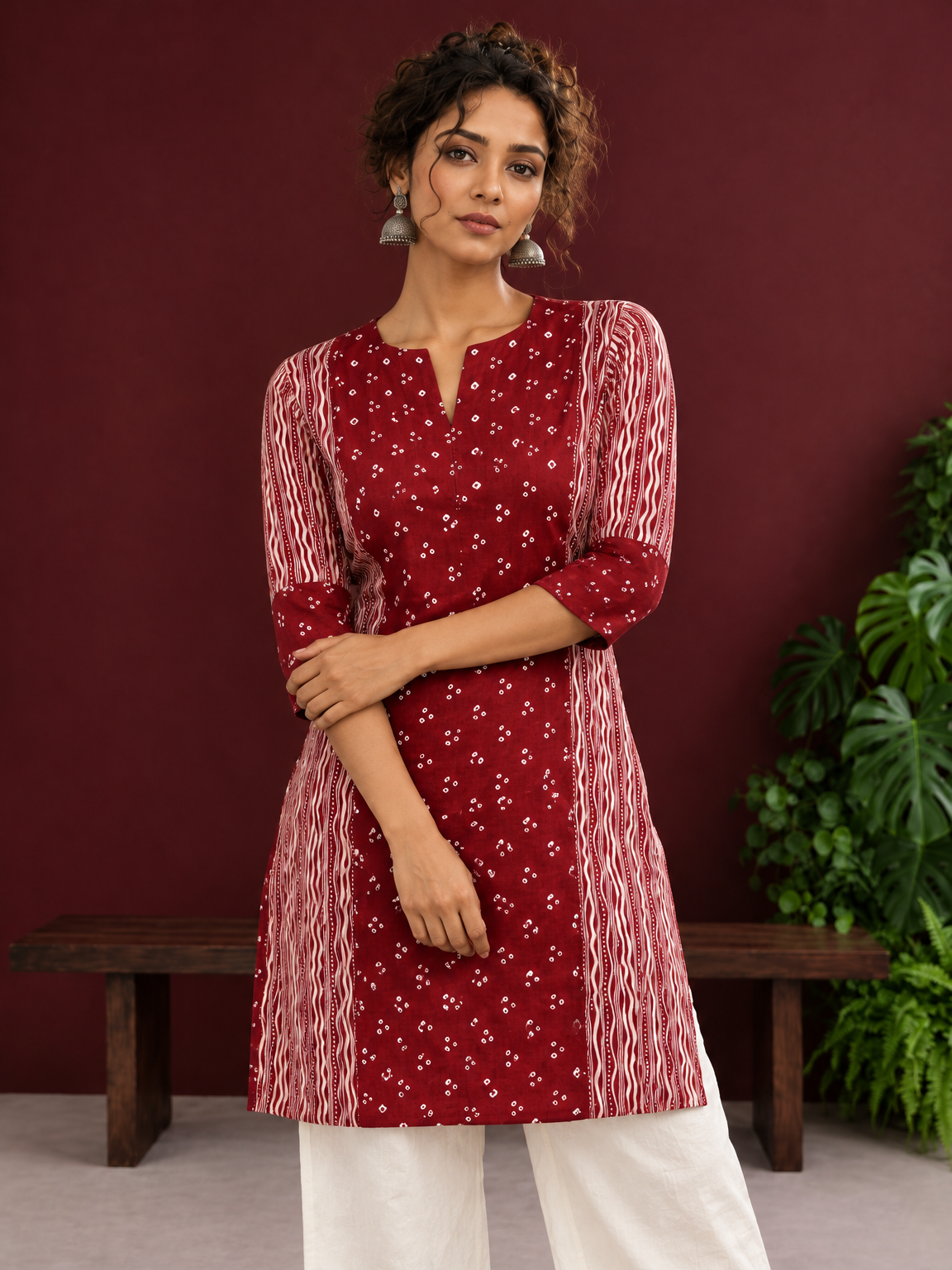Maroon Rayon Tunic with Bandhani Dot Print Front Panel and Contrast Wavy Striped Sleeves & Side Panels — styled view