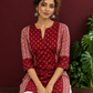 Maroon Rayon Tunic with Bandhani Dot Print Front Panel and Contrast Wavy Striped Sleeves & Side Panels — seated detail