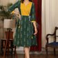 Bottle green ikat with mustard pintex yoke combination dress