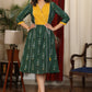 Bottle green ikat with mustard pintex yoke combination dress