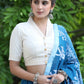 Smart Cream Cotton Collared Blouse Highlighted with Beautiful Lace Detailing and Golden Buttons