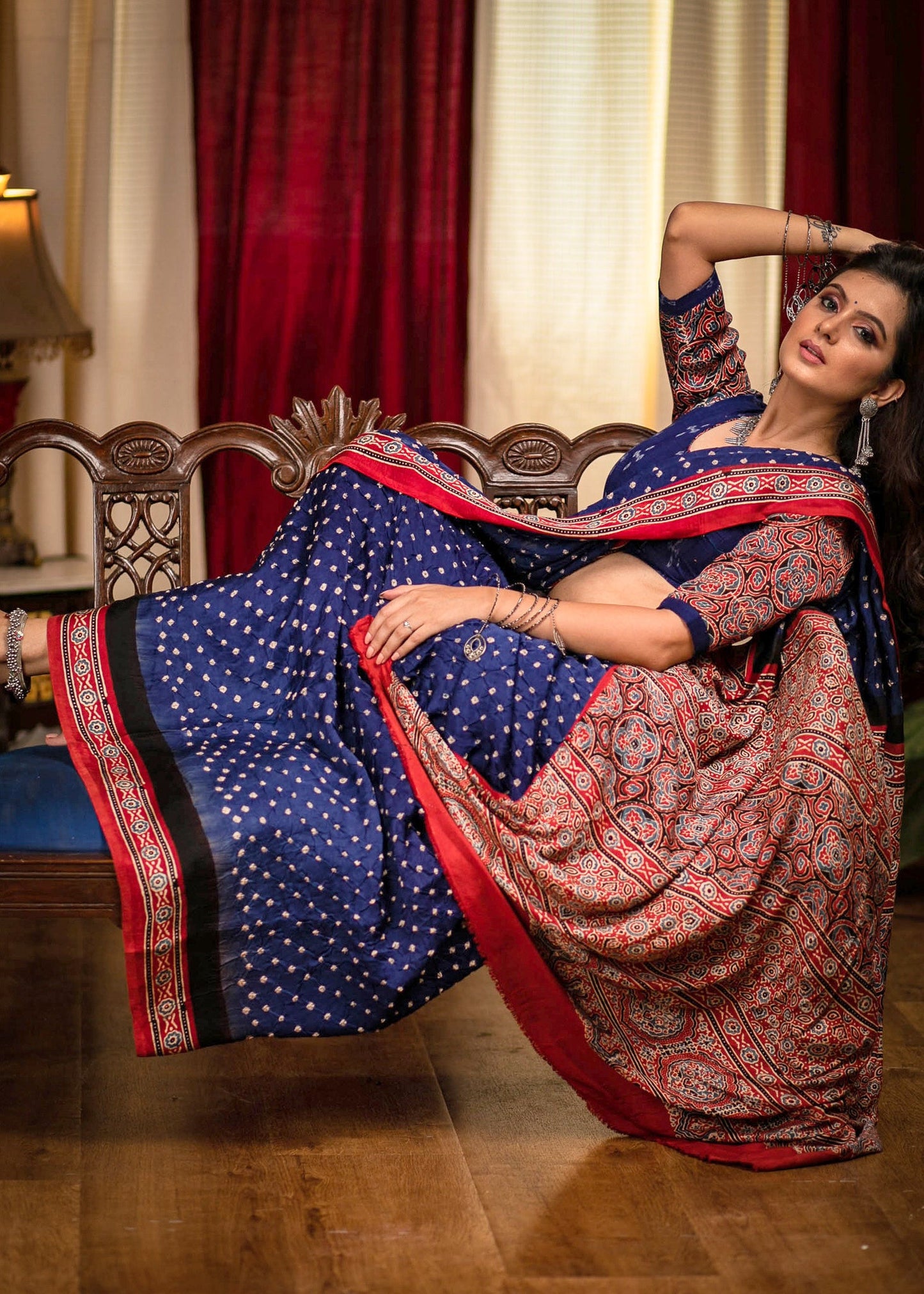 Exclusive modal silk Bandhej saree with Ajrakh block printed border & pallu