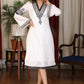 Straight ebony and ivory appliqued bell sleeve embroidered dress highlighted with velvet lace
