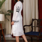 Straight ebony and ivory appliqued bell sleeve embroidered dress highlighted with velvet lace