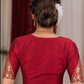 Elegant maroon cotton silk blouse highlighted with banarasi cutout on sleeves