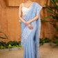 Elegant Powder Blue Organza Saree Highlighted With Overall Intricate Floral Embroidery