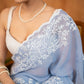 Elegant Powder Blue Organza Saree Highlighted With Overall Intricate Floral Embroidery