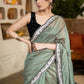Elegant Sage Green Chanderi Saree Highlighted With Contrast Floral Lace