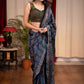 Pure modal silk block printed blue Ajrakh saree with floral motifs