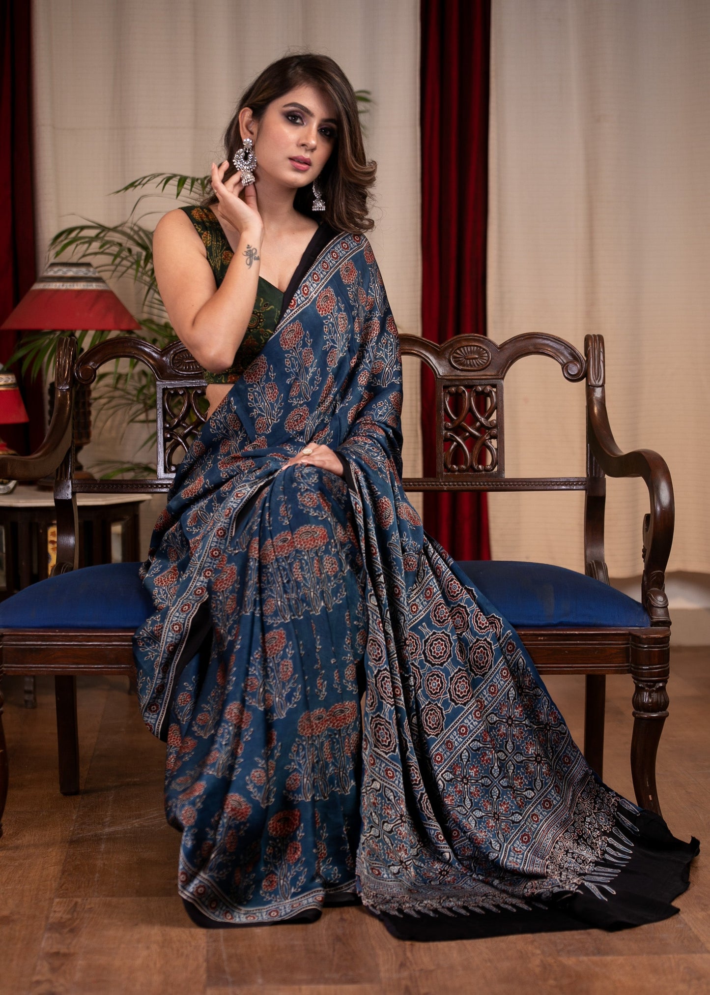 Pure modal silk block printed blue Ajrakh saree with floral motifs