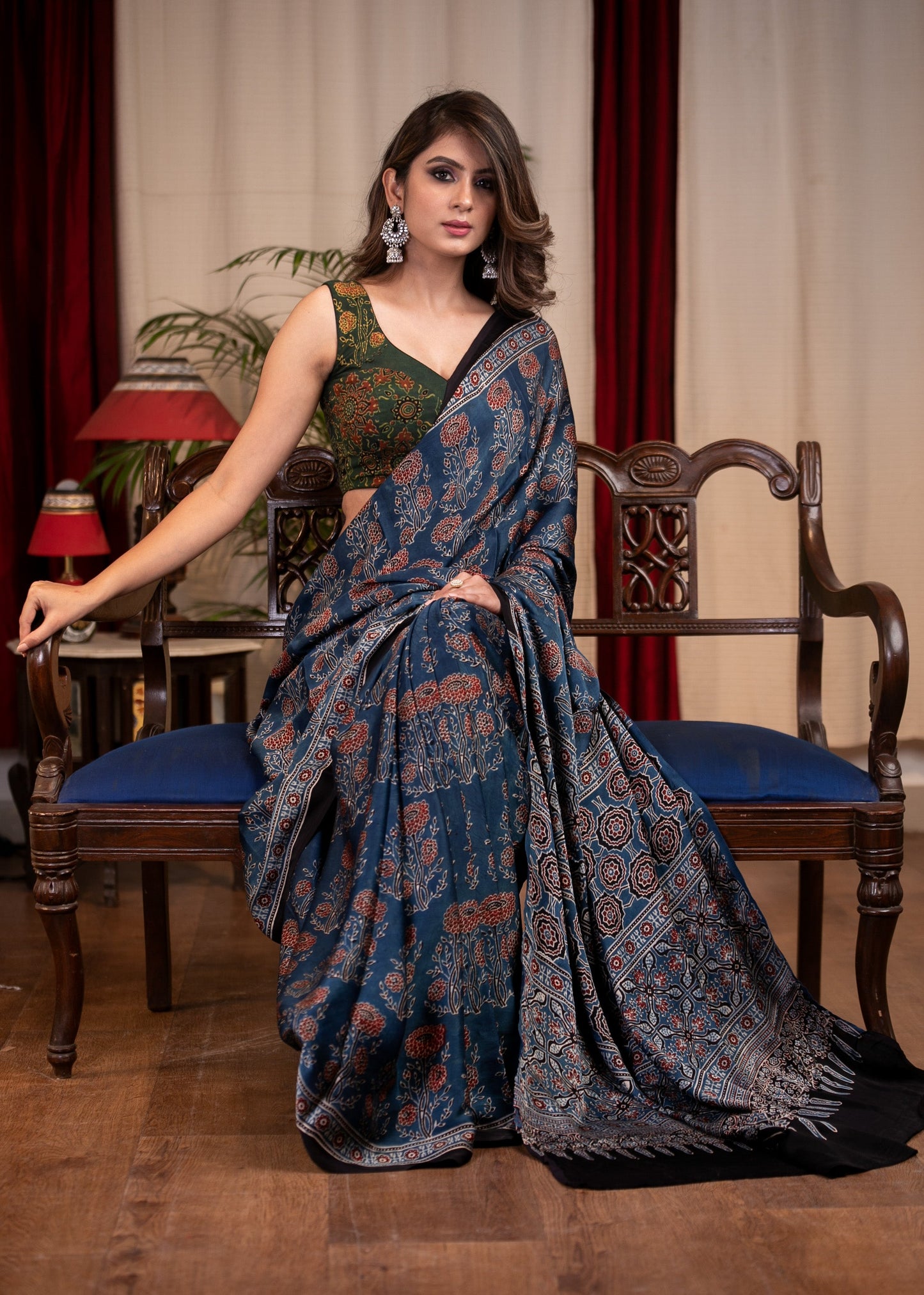 Pure modal silk block printed blue Ajrakh saree with floral motifs