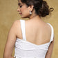 Elegant white Chikankari strappy blouse with Moti detailing.