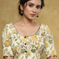 Classy cream Cotton block printed blouse with brown detailing and brown buttons - Plain Saree Optional