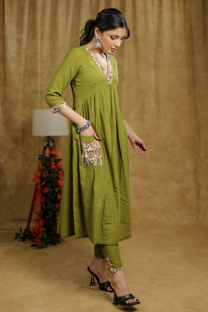 Breezy Mehendi green cotton kurti with floral print detaling & pocket