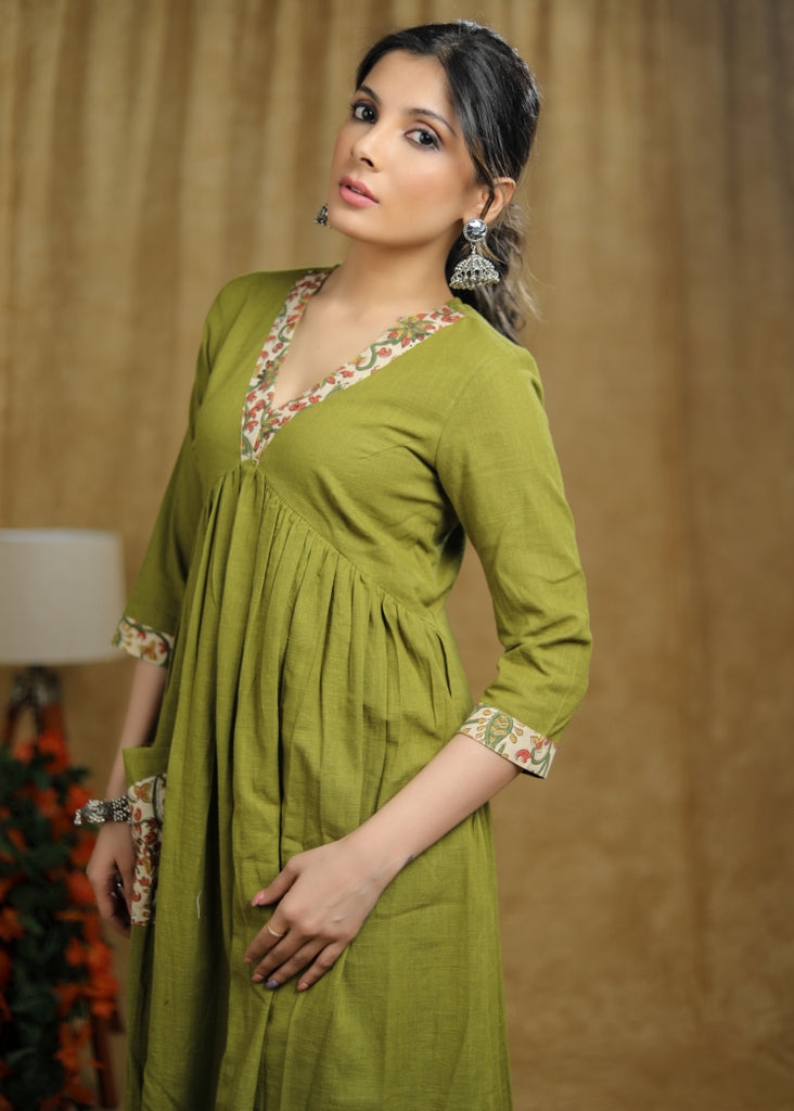 Breezy Mehendi green cotton kurti with floral print detaling & pocket