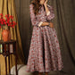 Trendy Kota silk collared dress with beautiful kalamkari print highlighted with pearl embellishments