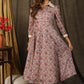 Trendy Kota silk collared dress with beautiful kalamkari print highlighted with pearl embellishments