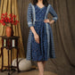 Beautiful indigo gathered dress with coin embellishments