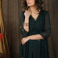 Beautiful bottle green gathered dress with minimal hand embroidery and georgette hemline