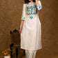 Graceful Off-White Cotton Silk Kurta & Pant Set with Intricately Embroidered Yoke