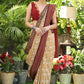 Exclusive mustard printed Cotton saree Accentuated with Ajrakh and Mirror border