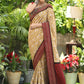 Exclusive mustard printed Cotton saree Accentuated with Ajrakh and Mirror border
