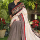 Regal cotton line Ajrakh saree with cream Pallu and Kalamkari border